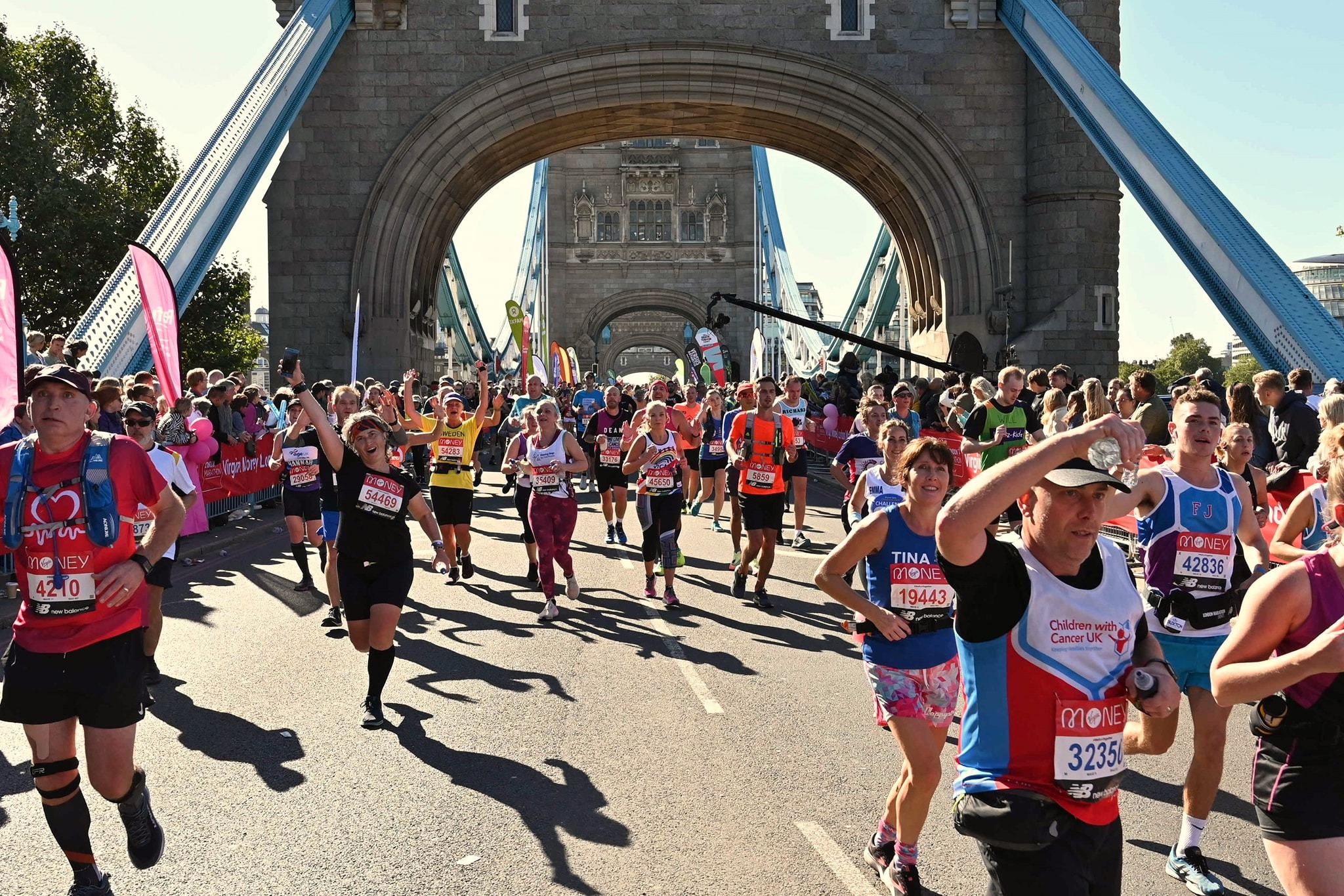 Running on Tower Bridge during 2022 Virgin Money London Marathon